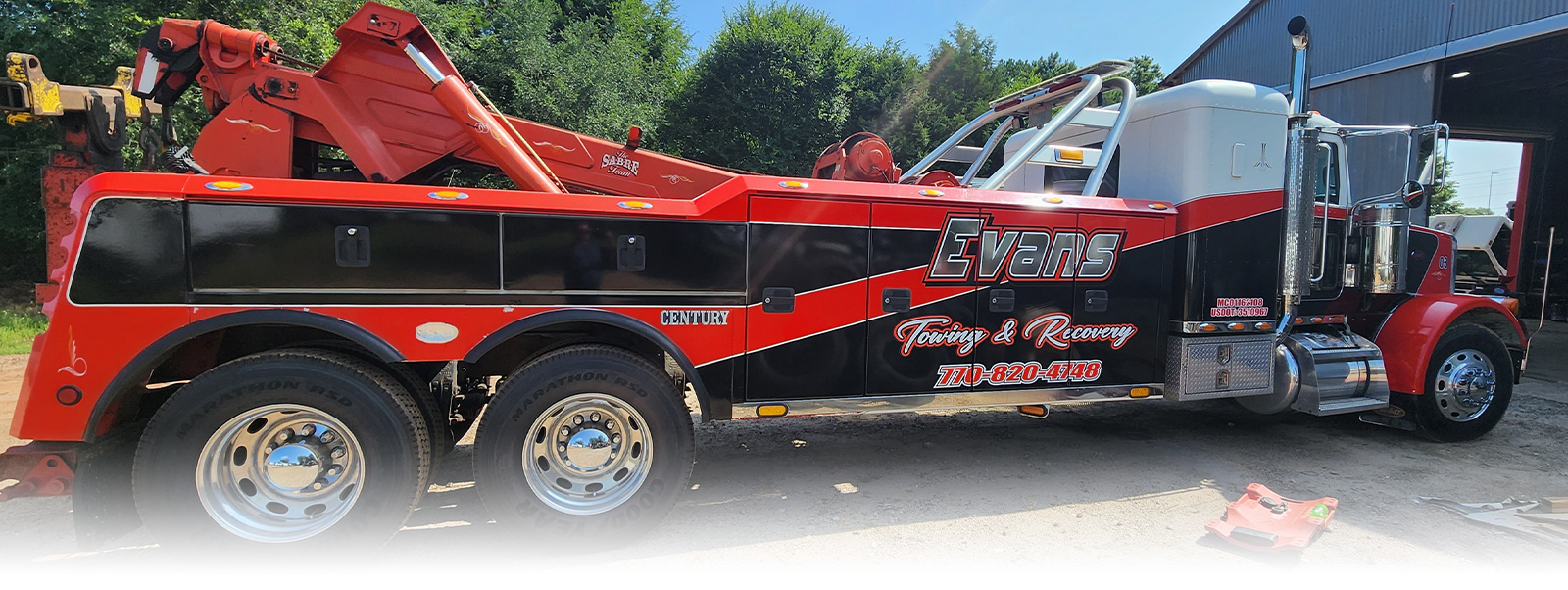 Parked Truck of Evans Towing & Recovery Service